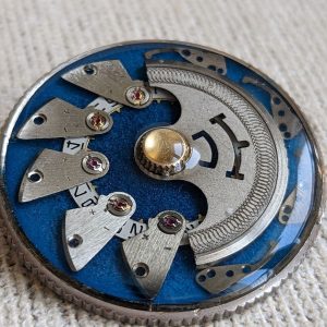 Steampunk brooch in blue colors